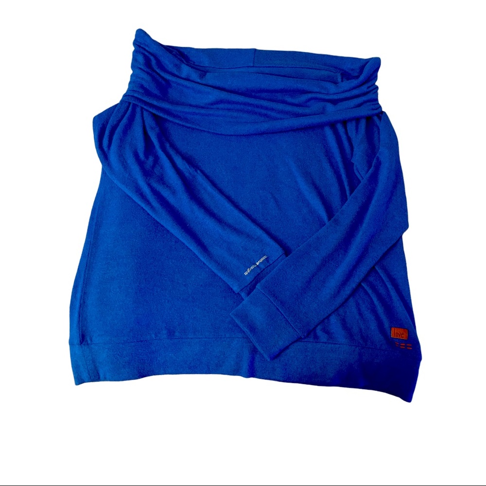 Peace Love World woman’s off the shoulder blue knit top